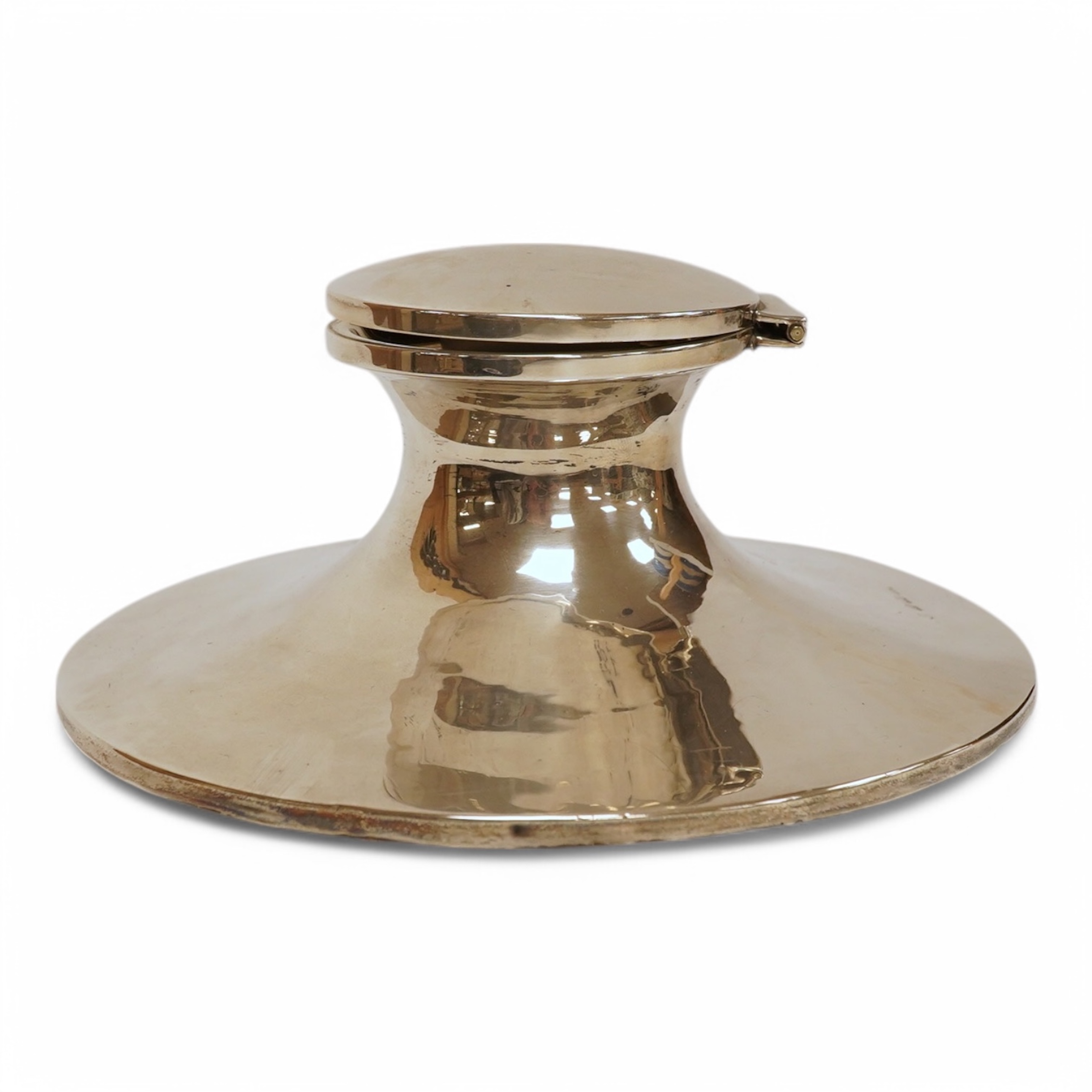 A George V silver mounted capstan inkwell, maker's mark rubbed, Birmingham, 1911, with later plastic well, base diameter 17.7cm. Condition - fair